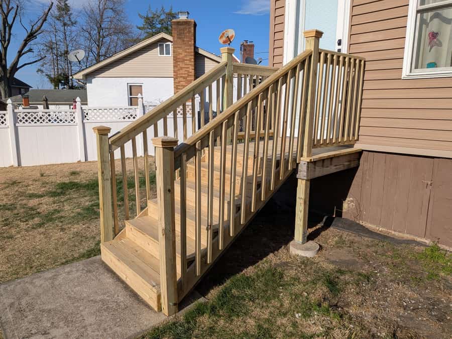 New pressure-treated deck stairs and railing built in East Brunswick NJ